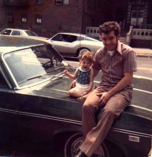 My dad and I seated on a 1970's Chevy Nova in the Bronx
